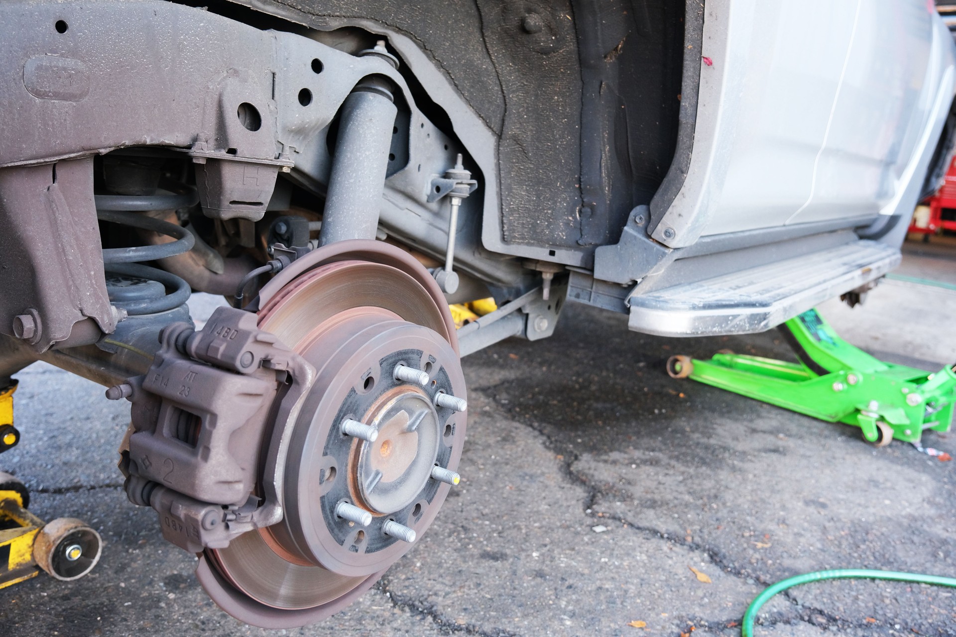 Car in auto mechanic shop